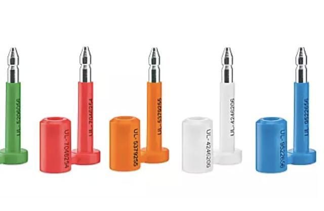 Colored powder-actuated fastening tools with matching base stands in five colors