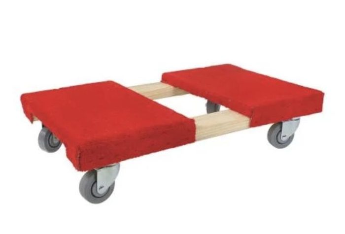 Red fabric moving dolly with wooden platform and casters