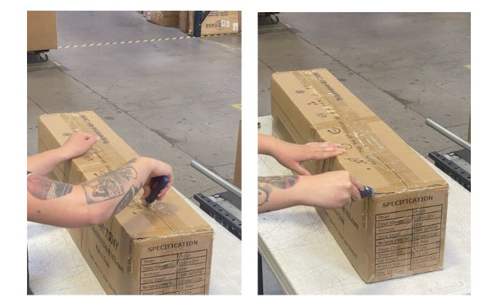 Cardboard box being inspected with hands on top surface