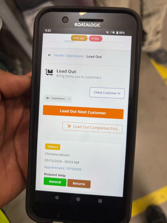 Datalogic mobile device showing Load Out workflow for customer delivery operations