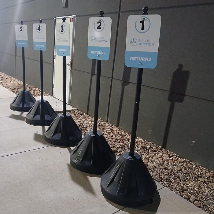 Returns drop-off stations numbered one through five at auction facility