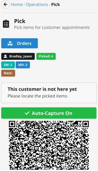 Pick screen showing customer order with QR code for item location