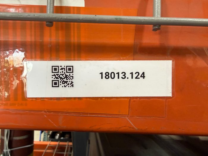 Orange tote with QR code label and inventory number 18013.124