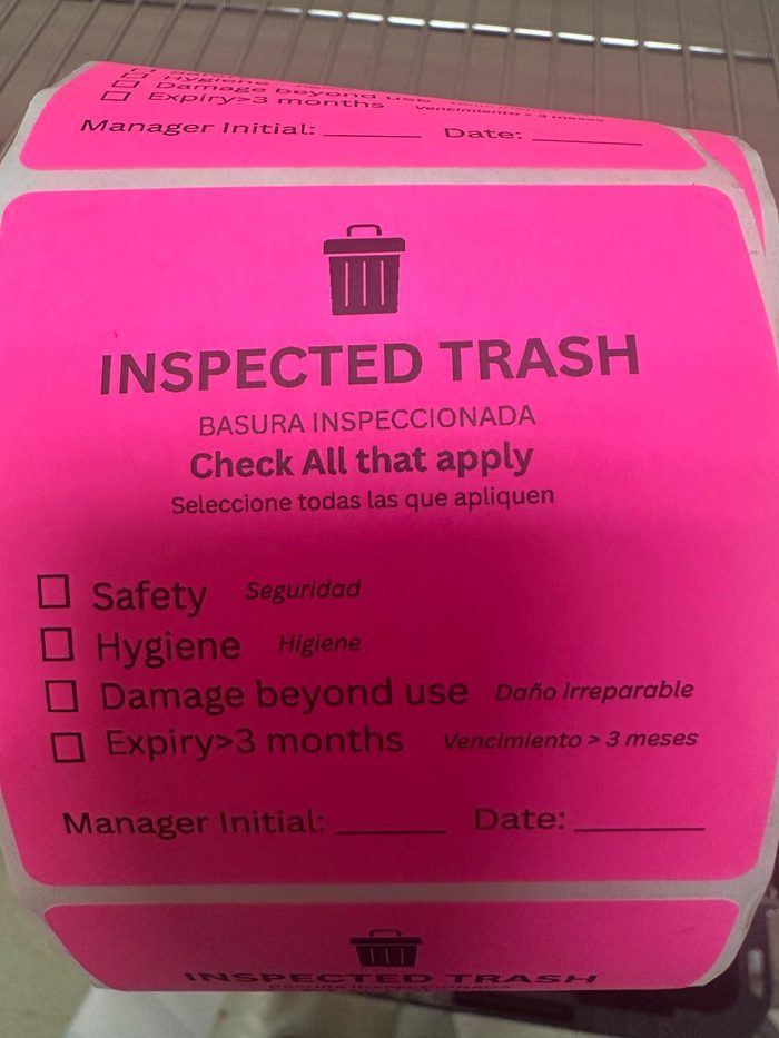 Pink inspection trash tags with bilingual safety checklist boxes