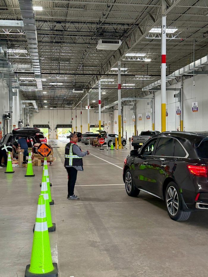 Vehicle driving course with safety cones and instructor training