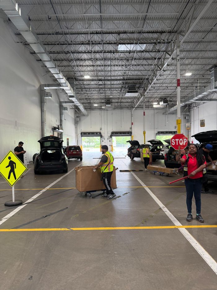 Warehouse safety training exercise with pedestrian and vehicle traffic simulation